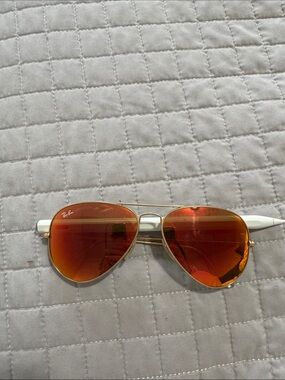 Ray-Ban Gold Frame Sunglasses with Red-Orange Mirrored Lenses and White Temples